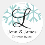 Blaues Schneeflocke-Monogramm L Siegel Dezembers Runder Sticker