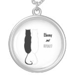 Ebenholz-und Elfenbein-Katzen Amuletten