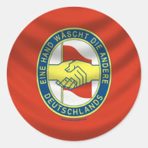 Eine Hand wäscht die andere! Runder Sticker