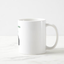 FOTOGRAF AM ARBEITS-BECHER KAFFEEHAFERL