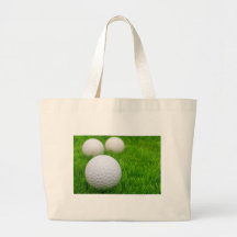 Golfbälle im Gras Leinentaschen