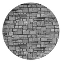 Graue ungleiche Steinwand Flache Teller
