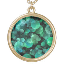 Green and Blue Circle Bubbles over a Black Custom Jewelry