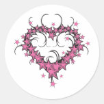 Herzform spielt Tätowierungsentwurf die Hauptrolle Runde Sticker