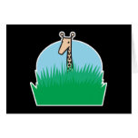 niedliche Giraffe im Gras Grußkarte