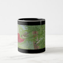 Rubin-Kehlen am Zufuhr-Becher Kaffee Tasse