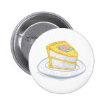 Scheibe des Kuchens mit gelbem und rosa Zuckerguss Buttons