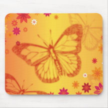 Schmetterlinge auf einem Blumenhintergrund Mousepads