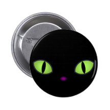 Schwarze Katze mit großen grünen Augen Buttons