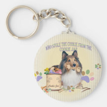Sheltie stahl das Plätzchen vom Plätzchen-Glas Schlüsselband