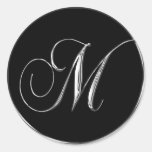 Splitter des Monogramm-Buchstabe-M auf schwarzem H aufkleber