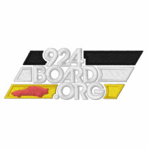 Stickerei 100131 4c Sebring Wh-Bk-Wh-Ye-Re.  Besticktes Shirt