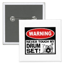 WARNING - TROMMELN ANSTECKNADELBUTTONS