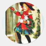 Weihnachtsgruß mit einem Mädchen öffnet eine Tür m Runde Sticker