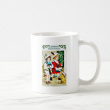 Weihnachtsgruß mit zwei Kindern, man spielt Tromme Kaffee Tassen