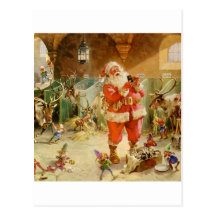 Weihnachtsmann und seine Elfe im Ren-Stall Postkarten