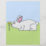 Weißes Kaninchen. Auf einem Rasen Flyer