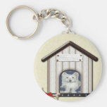 Westie Hund in der Hundehütte Schlüsselband