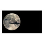 zwei Hubschrauber silhouettiert durch einen Vollmo Visitenkarte