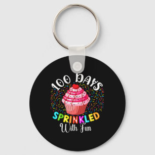 100 Tage mit Spaß gesprenkelter Cupcake 100. Tag i Schlüsselanhänger