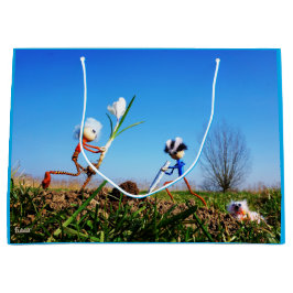 2 Fubby's die een bol krokus planten. Große Geschenktüte