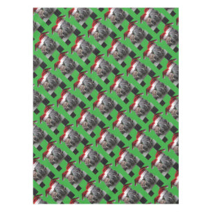 2 Pferde Küssen Weihnachtsmannmützen tragen Tischdecke