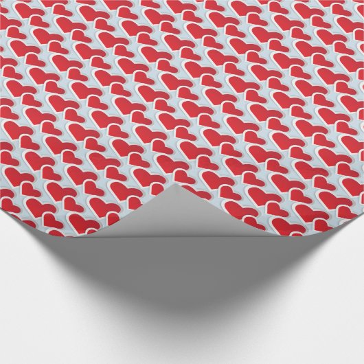 2 Rotes Papier Herz in einem sich wiederholenden M Geschenkpapier (Ecke)