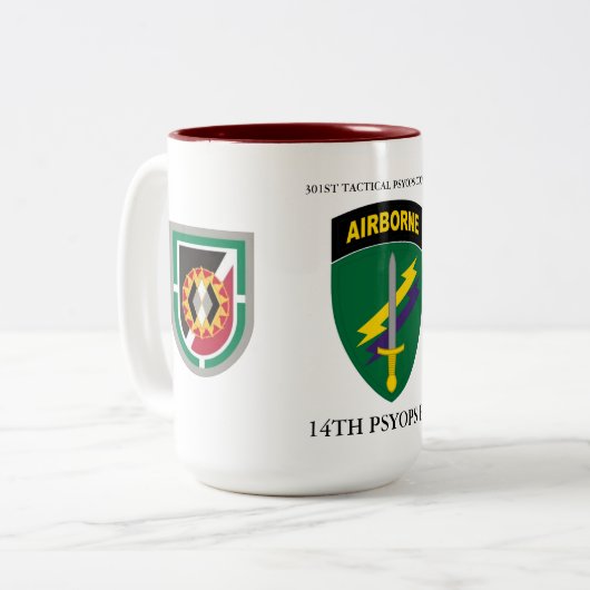 301. TAKTISCHE PSYOPS CO(ABN) 14. PSYOPS BN ZWEIFARBIGE TASSE (Vorderseite Links)