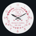 30th Wedding Anniversary Hearts Große Wanduhr<br><div class="desc">Celebrate a milestone wedding anniversary with this gorgeous and elegant wall clock with a design featuring a wreath with red and pink hearts.</div>