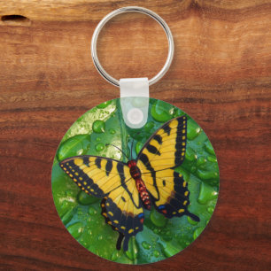 3D-Gelbe Schmetterling auf grünen Blättern Schlüsselanhänger