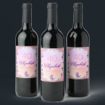 40th birthday party pink purple florals weinetikett<br><div class="desc">An elegant floral themed label for a 40th birthday party or tea party. A romantic violet, pink and peach colored background, purple and pink letters. With pretty flowers in blue and ultra violet bluebells, pink peonies and roses. A little lavender colored bird is singing. Templates for a name, age 40...</div>