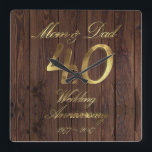 40th Wedding Anniversary Ruby Wedding Parents Quadratische Wanduhr<br><div class="desc">Mom and Dad 40 years together,  Number 40 Gold Look Typography Ruby Wedding Anniversary 40th Wedding Anniversary 40th Anniversary Party Rustic Wooden Photography Background Elegant Wall Clock Unique Anniversary Gift for Parents</div>