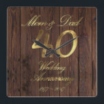 40th Wedding Anniversary Ruby Wedding Parents Quadratische Wanduhr<br><div class="desc">Mom and Dad 40 years together,  Number 40 Gold Look Typography Ruby Wedding Anniversary 40th Wedding Anniversary 40th Anniversary Party Rustic Wooden Photography Background Elegant Wall Clock Unique Anniversary Gift for Parents</div>