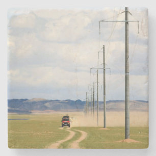 4X4-Fahrzeuge auf einer Schotterstraße, Gobi-Wüste Steinuntersetzer