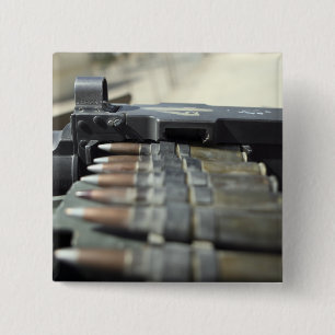 50-kalibrige Maschinenpistolen Button