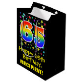 65. Geburtstag: Farbenfrohe Sterne Muster & Regenb Mittlere Geschenktüte (Vorderseite Schrägansicht)