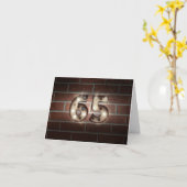 65. Geburtstagslichter an der Backsteinwand Karte (Gelbe Blume)