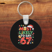 67 Meme Funny Christmas Meme Design Most Likely To Schlüsselanhänger (Vorderseite)