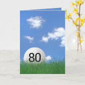 80. Geburtstag, Golfball im Gras Karte (Gelbe Blume)