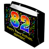 82. Geburtstag - Farbige Musiksymbole, Regenbogen Große Geschenktüte (Rückseite Schrägansicht)