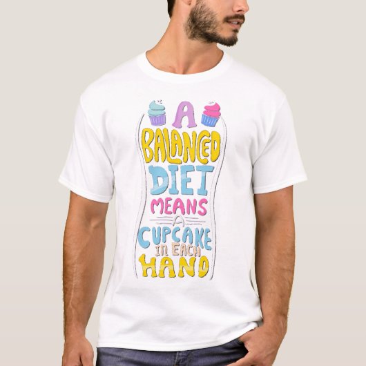 A balanced diet means a cupcake in each hand T-Shirt (Vorderseite)
