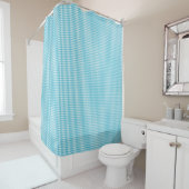 A blue checkered shower curtain is shown duschvorhang (Beispiel)