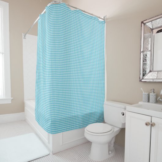 A blue checkered shower curtain is shown duschvorhang (Beispiel)