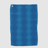 A blue towel with a subtle dotted pattern hangs  golfhandtuch (Vorderseite)