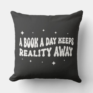 A Book A Day Keeps Reality Away Kissen