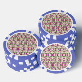 A casino chip features intricate floral patterns (Stapel)