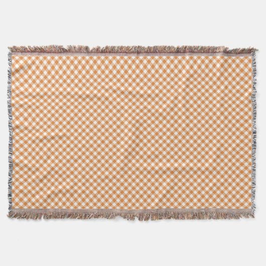 A checkered pattern throw blanket with orange  decke (Vorderseite)