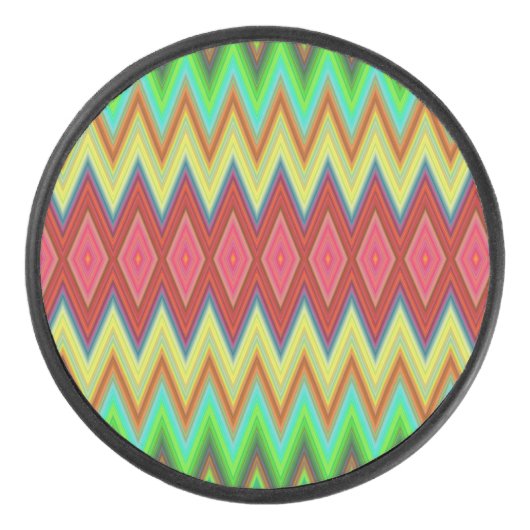 A circular speaker with a vibrant, zigzag pattern eishockey puck (Vorderseite)