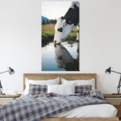 A cow drinks water in a natural stream leinwanddruck (Insitu (Schlafzimmer))