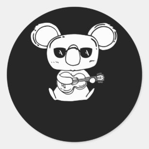 A Four String Ukulele Instrument With Koala Runder Aufkleber